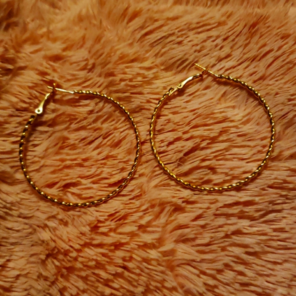 Faux golden hoop earrings. Brand new!!!